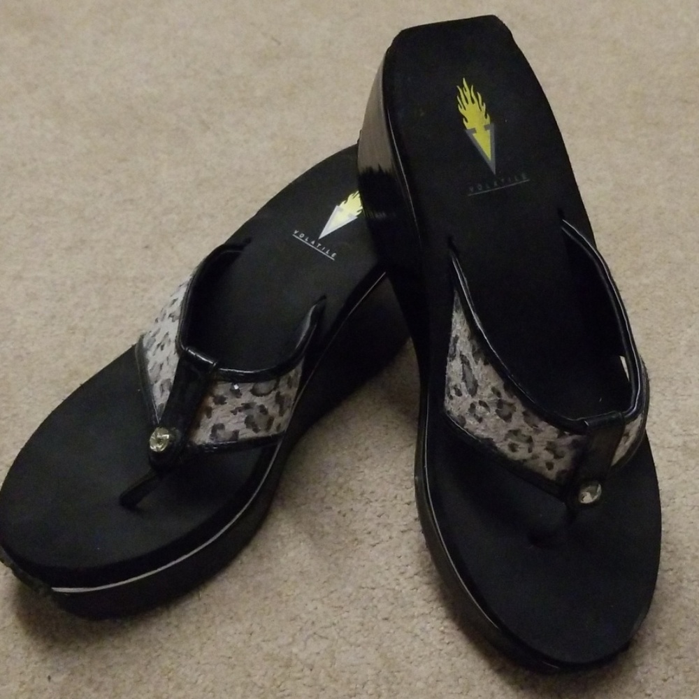 Volatile leopard flip flop